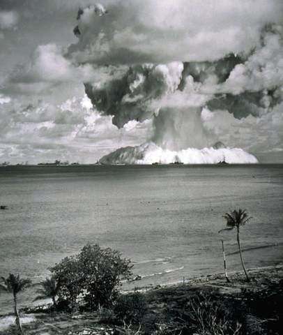 This is a picture of a nuclear bomb or a nuclear power plant exploding.  It shows how big the explosion can be and how much land it will destroy.  The bomb/power plant going off is a tall cloud that can be seen for miles and miles. Kwajalein Atoll, Nuclear Test, Social Research, The Marshall, Bin Laden, University Studying, Destroyer Of Worlds, Nuclear Power Plant, Marshall Islands