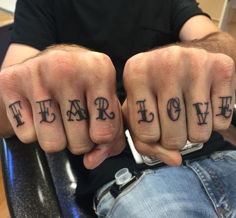 Knuckle tattoo set by Violet Page Knuckle Font Tattoo, Knuckle Tats For Women, Love On Finger Tattoo, Knuckle Tattoos Lettering, Men Knuckle Tattoos, Fear Love Tattoo, Word Tattoos On Fingers, Finger Tattoos Words Knuckles, Word Knuckle Tattoos