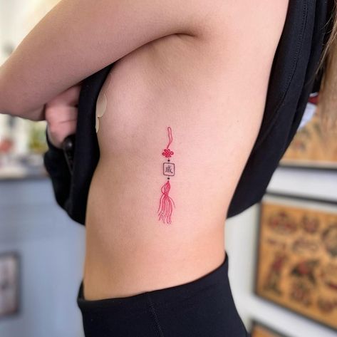 Unique Chinese Tattoos, Chinese Red Knot Tattoo, Chinese Knot Tattoo Design, Chinese Knot Tassel Tattoo, Dainty Chinese Tattoo, Asian Knot Tattoo, Lucky Knot Tattoo, Asian Charm Tattoo Design, Japanese Good Luck Charm Tattoo