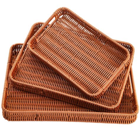 PRICES MAY VARY. Include 3 sizes imitation rattan woven serving trays with easy carrying handles, measure large 15.8'' L x 11.6'' W x 1.7'' H, medium 13.8'' L x 9.7'' W x 1.7'' H, small 11.5'' L x 7.3'' W x 1.7'' H. The rectangular woven basket is constructed of durable polypropylene fibers, exquisite workmanship, giving no hard jagged edges, reinforced at the rim and base with internal wire ribs. The refreshing design and subtle texture of this basket adds a beautifully rustic charm to holding, Vegetables Breakfast, Breakfast Drinks, Bread Baskets, Breakfast Vegetables, Woven Trays, Wicker Baskets With Handles, Coffee Snacks, Rattan Tray, Fruit Storage