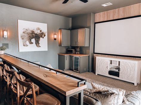 Love this amazing DIy bar top console in this at home theater room. #theater #hometheater #mediaroom Home Theatre And Bar, Bar And Theater Room, Bonus Room Above Garage Theater Home Theatre, Theatre Room With Bar, Farmhouse Home Theater, Diy Basement Movie Theater, Garage To Movie Room, Game Room With Kitchenette, Media Room With Kitchenette