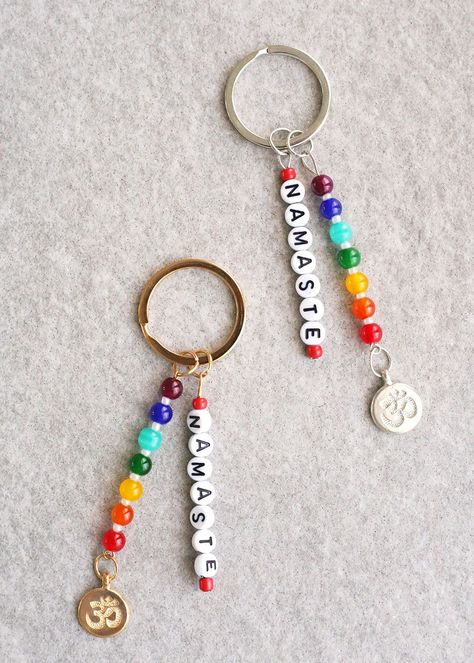 Bright fun colorful beads to add to your keychain collection Easy to use keychain ring with NAMASTE letter beads Backpack Bead Keychain, Crafts With Letter Beads, Best Friend Keychains, Glass Bead Keychain Diy, Heishi Bead Keychain, Metal Keychain Ideas, Bead Name Keychain, Pony Bead Crafts Keychains, Letter Beads Ideas