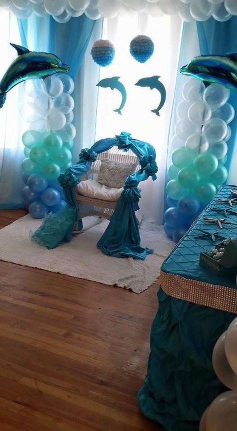 Chair of honor at a dolphin baby shower party! See more party planning ideas at CatchMyParty.com! Dolphin Birthday Parties, Dolphin Party, Ocean Baby Showers, Sea Baby Shower, Sea Birthday Party, Mermaid Baby Showers, Mermaid Parties, Baby Mermaid, Mermaid Birthday Party