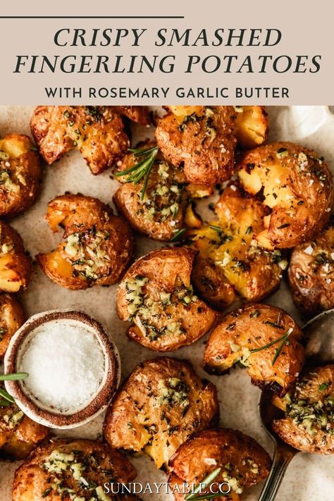 These crispy smashed fingerling potatoes with rosemary garlic butter are one of the best potato side dishes! With baby potatoes, fresh rosemary, & lots of garlic, they're buttery and creamy in the center. These potatoes are boiled and then roasted in the oven so they get nice & crispy. You can make them with gold potatoes, red potatoes, or a mix. Or, try topping them with parmesan! Serve these potatoes with steak, chicken, or any of your favorite dinner recipes. They're the best easy side dish! Potatoes With Steak, Best Potato Side Dishes, Smashed Fingerling Potatoes, Rosemary Garlic Butter, Gold Potato Recipes, Fingerling Potatoes Recipes, Favorite Dinner Recipes, Steak Sides, Smashed Potatoes Recipe