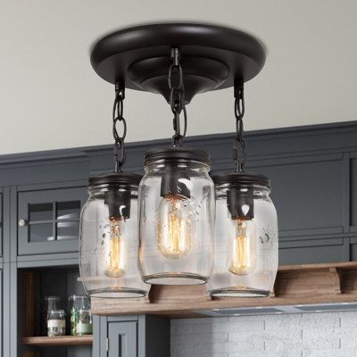 This is an industrial pendant and made of 3 Mason glasses, the surface of glass shade is designed with unique water and letter patterns, all the metal parts are covered by A-grade black finish, which is vintage yet classic, making your room full of retro and outstanding in 1 second! | Breakwater Bay Allensworth 3 - Light Jar Pendant Glass in Black | 7 H x 4 W x 4 D in | Wayfair Primitive Lighting, Jar Lights, Industrial Pendant, Living Ideas, Chandelier Ceiling Lights, Rustic Living, Globe Pendant, Basement Ideas, Letter Patterns