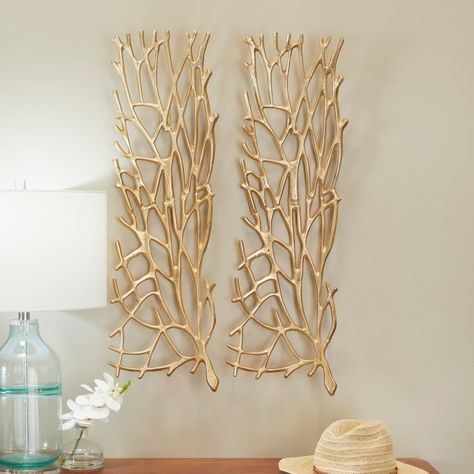 "Get the Gold Aluminum Inspired Coral Wall Decor Set of 2 11\", 33\" at Michaels. com. Give your home a personalize touch and bring your creative vision to life. Decorate with ease with our eclectic range of home decor. Decorate with fun with Iris And Ivory Modern style inspired by a minimalistic design with clean lines and angular structures. Gold wall decor is crafted with solid aluminum for a lightweight and sturdy design. Polished gold finish highlights these branch inspired wall panels. Mod Coral Walls, Gold Wall Decor, Gold Living Room, Geometric Wall Decor, Nails And Screws, Cut Out Shapes, Wall Decor Set, Gold Walls, Outdoor Art