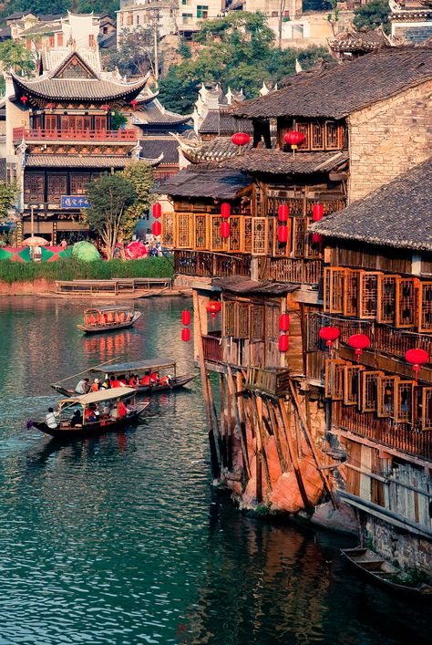 Fenghuang County (凤凰县), Hunan, China, is an exceptionally well-preserved ancient town. To visit find a travel agent near you!  http://www.mvptravel.com/r2s/LocatorPage.html Chongqing, Guilin, Zhangjiajie, Beauty Captions, Red Lanterns, Hunan China, Magic Places, Flight Deals, British Airways