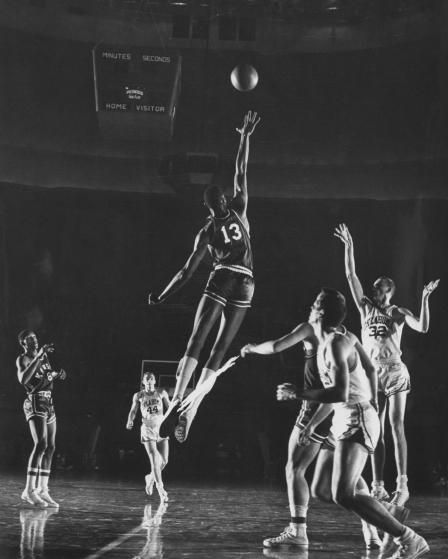University of Kansas basketball player Wilt Chamberlain, 1957. Sports Figures, Kansas Basketball, Posters Ideas, Wilt Chamberlain, Rock Chalk Jayhawk, Sporting Legends, Sports Posters, University Of Kansas, Basketball Legends