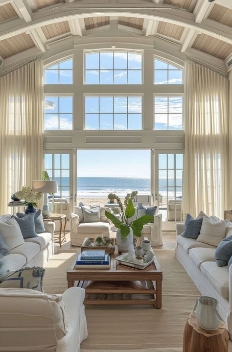 Seaside serenity captured in a newly designed coastal living room Coastal Living Room Accent Wall, Magical Minecraft, House With Big Windows, Barnodium Homes, Cathedral Ceiling Living Room, Rounded Table, Cozy Porch, Earthy Living Room, Vaulted Ceiling Living Room