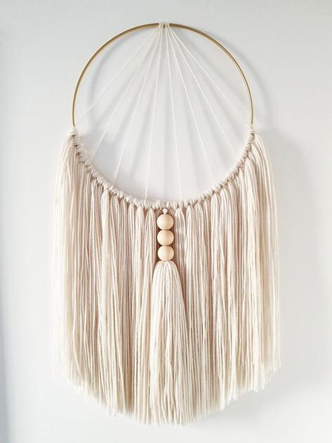 Cream Macrame Wall Hanging Natural Wooden Beads and Handmade Tassel | Macrame patterns, Macrame patterns tutorials, Macrame design Diy Wall Hanging Yarn, Dekorasi Bohemia, Atrapasueños Diy, Simpul Makrame, Macrame Hoop, Yarn Wall Art, Macrame Wall Hanging Diy, Macrame Wall Decor, Macrame Wall Hanging Patterns