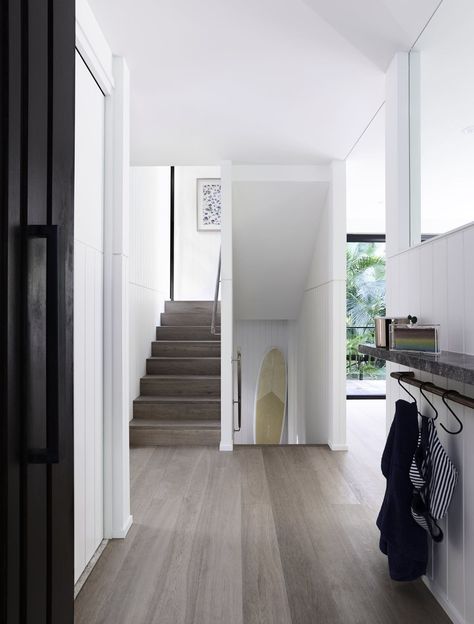 A bright, light-filled entry into this serene home in the Australian rainforest. Coastal House Interior, Modern Coastal House, Bright Hallway, Australian Interiors, Floors Ideas, Mim Design, Coastal Architecture, Coastal Bedding, Light Hardwood Floors