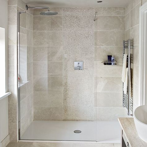 After traditional bathroom decorating ideas? Take a look at this neutral bathroom with beautiful tiles from Ideal Home for inspiration. Find more bathroom decorating and shopping ideas at housetohome.co.uk Natural Stone Tile Bathroom, Stone Tile Bathroom, Traditional Bathroom Decor, Makeover Kamar Mandi, Natural Stone Bathroom, Neutral Stone, Beautiful Tiles, Neutral Shower, Neutral Bathroom