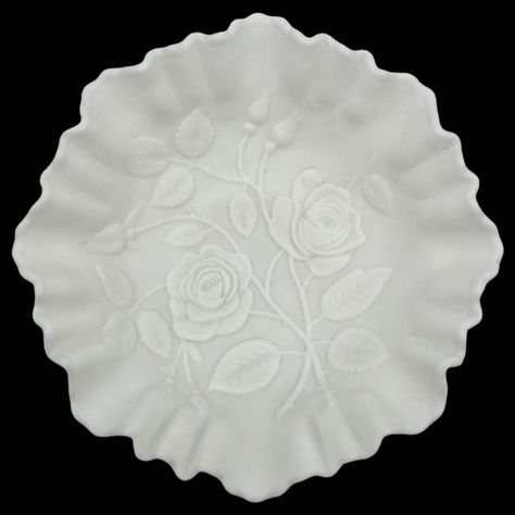 For your consideration is this beautiful vintage decorative bowl from Imperial Glass Company of Bellair, Ohio, a must-have for any collector or lover of unique decorative pieces. With its stunning pressed rose design on the interior and exterior, ruffled and crimped edge, and doeskin satin finish, this bowl is a true work of art. The matte white color and flat footed base add to its elegant Victorian style.   Perfect for any occasion, whether its for love and romance, Mothers Day, a baby shower, Rose Bowl, Imperial Glass, White Milk Glass, Glass Company, Rose Design, Dinnerware Sets, Victorian Fashion, Milk Glass, Decorative Pieces