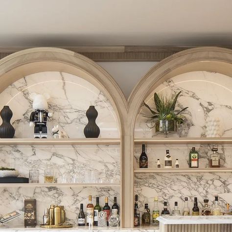 What home bar dreams are made of... . . . Fluted cotton stained oak, Calacatta Oro Extra marble, oak wall panelling, concealed LED lighti... | Instagram Arch Wall Bar, Arch Wall Cabinet, Arched Wet Bar, Bar Appliances, Bar Arch, Wood Tile Floor, Marble Cabinet, Home Bar Wall, Arch Bar