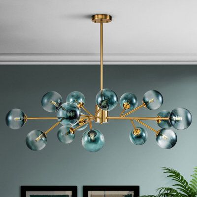 With a branching arm design, the 15-light Sputnik stairs linear chandelier is sure to make a bold statement in a living area in which you can hang it as an abstract work of art. This chandelier creates dispersed light with 15 glass globes in a different direction that greatly broadens your illumination area. This unique chandelier complements a range of interior spaces in a contemporary style. This mobile chandelier makes for an ideal addition to your stairs, living room, dining room, bedroom, a Branching Chandelier, Modern Linear Chandelier, Glass Globe Chandelier, Unique Chandelier, Mobile Chandelier, Bubble Chandelier, Arm Design, Unique Chandeliers, Chandelier Metal