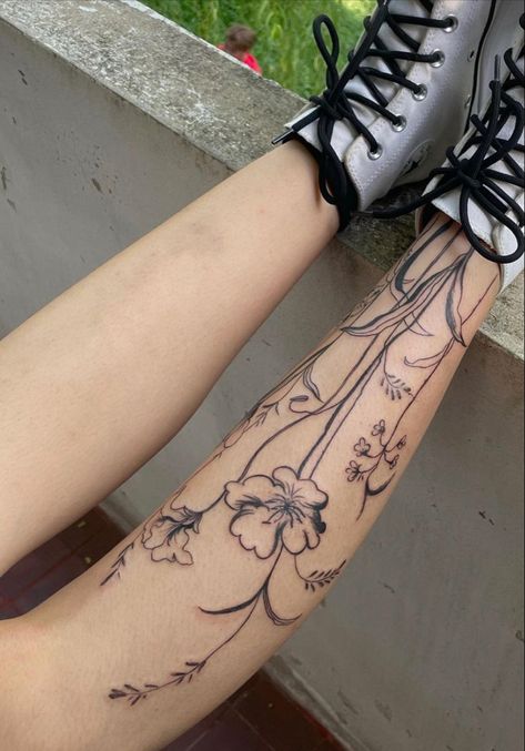 Patchwork Tattoo Linework, Cool Shin Tattoos, Shin Flower Tattoo, Symmetrical Leg Tattoos, Ankle Flower Tattoo Wrap Around, Floral Shin Tattoo, Flower Shin Tattoo, Leg Tattoo Aesthetic, Wildflower Leg Tattoo