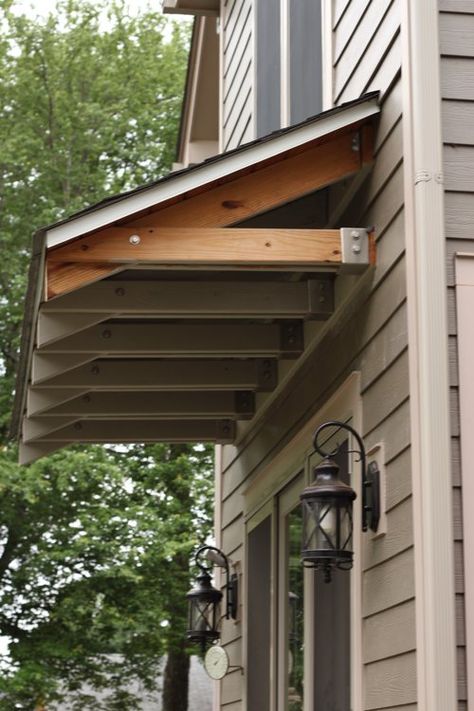 possible roof for basement entrance???from HOUSEography Front Door Awning, Door Overhang, House Awnings, Diy Awning, Porch Awning, Basement Entrance, Porch Roof, Door Awnings, Door Canopy