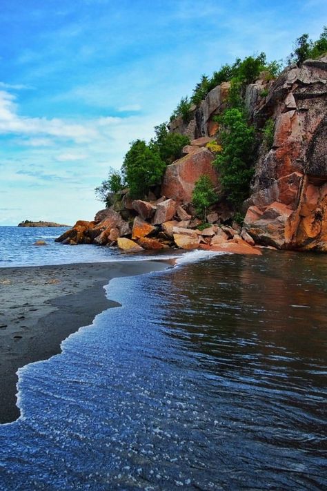 You don't have to leave the Midwest to visit a black sand beach! Along Lake Superior you will find Black Beach on Minnesota’s North Shore, unlike anything else in the state. Things To Do In Minnesota | Minnesota Beaches | Minnesota Black Beach | Lake Superior Beaches | Minnesota Day Trips | Beaches | MidWest Travel | US Travel | Black Sand Beach The North Shore Minnesota, North Shore Lake Superior, Black Beach Minnesota, Black Sand Beach Minnesota, Lake Superior Minnesota, Lake Superior Aesthetic, Minnesota Beaches, Minnesota Aesthetic, Mn North Shore