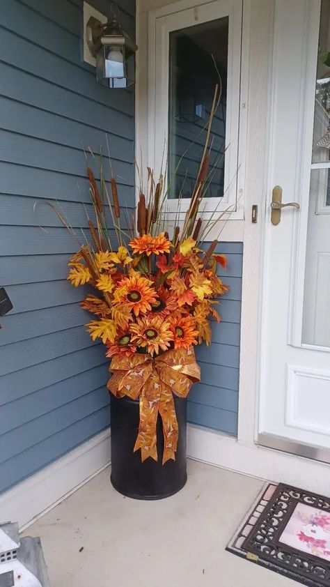 65+ Amazing Thanksgiving Porch Decorations for a Happy Fall - Holidappy Fall Milk Can Decor Front Porch, Fall Milk Can Ideas Front Porches, Fake Fall Flowers Outdoors, Fall Tree Topper, Fall Porch Pot Ideas, Fall Decorations For Porch, Corner Porch Fall Decor, Fall Flower Pots Front Porches, Fall Porches Ideas Autumn