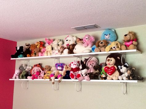 Shelves from IKEA. Collection down from 250+. Happy my pre-teen girl still wants to hold on to these Stuffed Animal Shelf Ideas, Plushie Shelves, Plushy Organization, Organizar Peluches Ideas, Plush Organization Ideas, Teddy Shelf, Plushie Shelf, Toy Collection Room, Stuffed Animal Displays