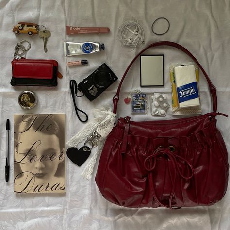red bag, red aesthetic, cherry red, rhode liptint, toast, what’s in my bag, the lover duras Inside My Bag, Purse Essentials, Handbag Essentials, In My Bag, What In My Bag, Joan Jett, I'm With The Band, Bags Aesthetic, Pretty Bags