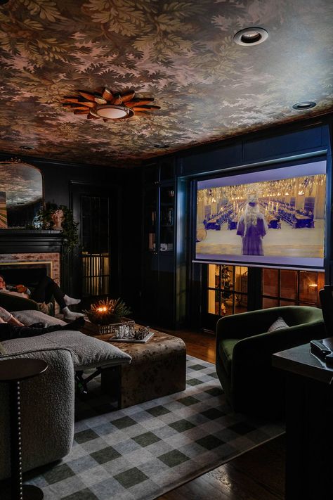 How to design the perfect small home theater setup with flexible media room seating, storage, lighting, and decor for a cozy space to spend family time. Maximalist Media Room, Media Room Recliners, Library And Media Room, Cinema Snug Room, Cinema Room Ideas Small Cozy, Moody Basement Theater, Home Theater Seats, Media Room Aesthetic, Cozy Basement Movie Room