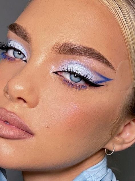 45+ Stunning 4th of July Makeup Looks That Will Make You Stand Out Blue Makeup Looks For Blue Eyes, White Blue Eyeshadow, Shimmer Blue Eye Makeup, Elegant Blue Makeup Looks, Blue Eye Makeup Festival, Touch Of Blue Makeup, Blue Ice Makeup, Blue Makeup Blue Eyes, Blue Looks Makeup