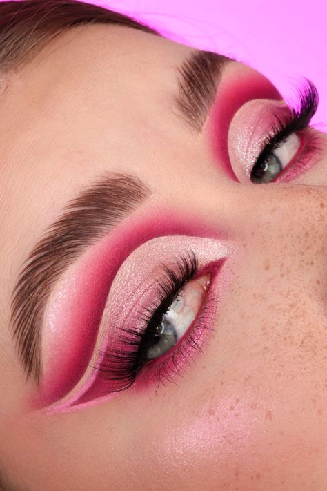 Close up photo of a pink eyeshadow look. Hot pink cut crease with eyeliner details and a shimmery pink eyelid. Vibrant Pink Eyeshadow Looks, Bright Makeup For Hooded Eyes, Purple And Red Eye Makeup, Bold Colourful Makeup, Pink Festival Eye Makeup, Eyeshadow Looks Bold, Pink Drag Makeup Looks, Creative Pink Makeup, Pink Makeup For Hooded Eyes