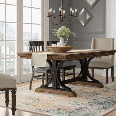 This Nailhead Extendable Dining Table brings a rustic-yet-refined charm to all your meals. The rubberwood construction will not expand and contract with varying temperatures and provides superior strength and durability. The curved sturdy base gives the table strong support and made it a long-lasting piece. Driftwood-finished accents and nailhead trim add a rustic touch and the table comes complete with an 18" wide extension leaf which makes room for 8 people. | One Allium Way® Alena Nailhead Ex Transitional Kitchen Tables, Dining Room Tables With Leaves, Dining Room Table 6 Chairs, Dark Wood Kitchen Table Decor, Cloth Dining Room Chairs, Dining Room Decor Tables, Dining Room With Bookshelves, Black And Wood Dining Table, Dining Room Decor Inspiration