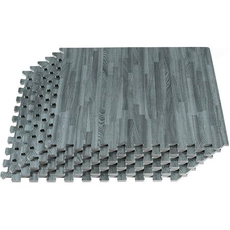A perennial best-seller, the 3/8-inch (10mm) thickness of Forest Floor Printed Wood Grain Interlocking Foam Mats is a popular choice for low- to moderate-traffic areas and low-impact personal fitness activities. Whether you're looking for a cost-effective general padding solution in your home or office, or you're setting up a space designed for childcare, play, or fitness, Forest Floor is the perfect solution for you. The slimmer thickness of the 3/8" series makes it an economical choice for a sophisticated home gym space, ideal for yoga, pilates, and bodyweight exercises such as push-ups, sit-ups, crunches, burpees, planks, squats, and lunges. Not recommended for high-intensity, high-impact, or weight-bearing exercises. Designed for assembly on a hard, flat indoor surface, the Forest Floo Interlocking Foam Mats, Best Flooring For Basement, Interlocking Floor Mats, Foam Floor Tiles, Foam Mat Flooring, Modular Tile, Interlocking Flooring, Foam Tiles, Basement Laundry Room