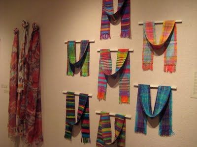 Love the way these are displayed.  created by risa: Nourishing my creative soul Weaving Display Ideas, How To Display Scarves At A Craft Show, How To Display Scarves, Fabric Display Ideas, Weaving Display, Scarf Display Ideas, Display Scarves, Hang Scarves, Scarf Display