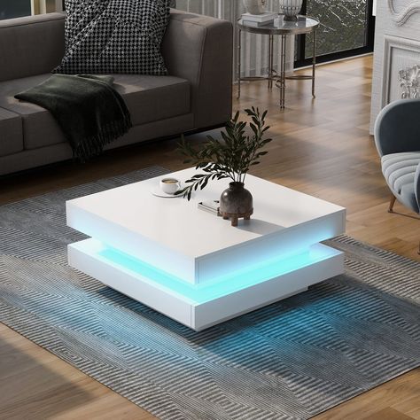 PRICES MAY VARY. Coffee Table with LED：It is a interesting and lighting coffee table, 16-color LED strip lights will offer some help to make many romantic or magical nights for users. The remote control allow users change the different lighting modes effortlessly. Ultra-modern Style：There is a liveliness in the stacking of geometric shapes. The simple and advanced shape brings more taste to your living room or reception room. Sturdy Material: This product is made of high-quality particle board, Minimalist Coffee Table, Pedestal Coffee Table, Reception Room, Square Coffee Table, Elegant Aesthetic, Sofa End Tables, Coffee Table White, Coffee Table Wayfair, Cozy Atmosphere