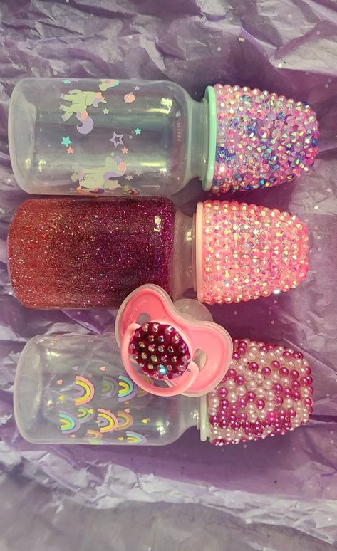 Baby bottles with bling and a pacifier with bling Bling Pacifier, Barbie Gifts, Bling Ideas, Girls Party Favors, Bling Crafts, Rhinestone Crafts, Baby Bling, Mommy Goals, Princess Outfits