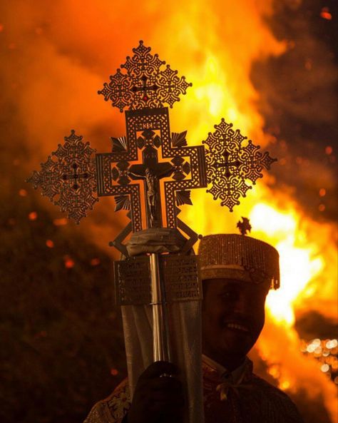 Meskel is a Christian holiday in the Ethiopian Orthodox and Eritrean Orthodox churches that commemorates the discovery of the True Cross by the Roman Empress Helena in the fourth century. Meskel occurs on the 17 Meskerem in the Ethiopian calendar. "Meskel" is Ge'ez for "cross". Huge Bonfire, Roman Empress, Ethiopian Orthodox, Ethiopia