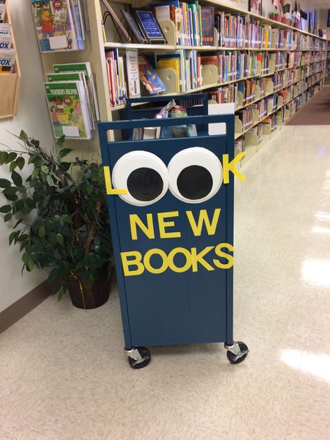 Decorated Library Book Carts, Welcome Back To Library, New Books Library Display, Library Book Drop Decoration, Library Decoration Ideas, New Books Display, Classroom Library Rules, College Library Displays, Teen Library Displays