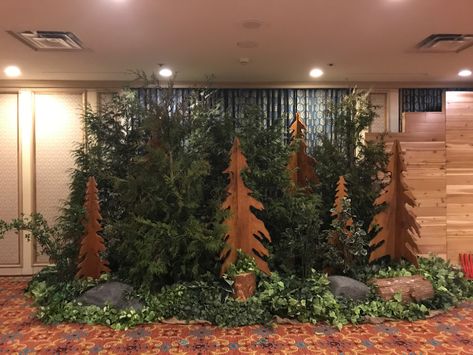 Live Evergreen Trees with Wood Cutout Tree Props // Corporate Themed Event Decor - Greenscape Design & Decor Evergreen Party Decor, Tree Props Stage Set Design, Wilderness Decorations, Alaska Themed Party Ideas, Alaska Party, Forest Decorations, Prop Idea, Hoco 2023, Tree Props