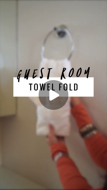 Rohina on Instagram: "🤍 Want to add a hotel touch to your guest bathroom? Here’s how you can display a hand towel and face towel set with a very simple fold.  Super easy, but looks like you’ve really put in the extra effort! Hope you all try it!  . . Turkish Cotton Towels - @aa.living  . #diyspa #spatowel #trythisathome #decordiy #towel #hoteldecor #foldingtutorial #towelfolds #towelfolding #towelfold #facetowel #handtowel #diyhomedecor #foldingtechnique #foldinghack #towelhack #homehack" How To Hang Washcloths In Bathroom, Bathroom Hand Towel Holder Ideas Small Spaces, Folding Towels On Towel Bar, How To Fold Bathroom Hand Towels, How To Fold Decorative Bathroom Towels Hanging Ideas, Creative Ways To Hang Towels In Bathroom, How To Fold Thick Towels, Folding A Hand Towel, How To Display Hand Towels In Bathroom