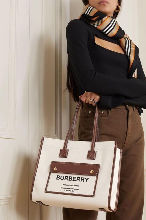 Top 15 Luxury Fashion Brands In the World (Our Best Pick) - Womeninspiredseries Fendi Tote Bag, Burberry Tote Bag, Tote Bag Outfit, Branded Tote Bags, Fendi Tote, Burberry Tote, Luxury Tote Bags, Burberry Outfit, Top Handbags