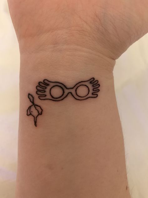 Luna is odd and doesn’t care what anyone thinks. She is genuinely herself all the time and I admire that and aspire to be like her. Tattoo by Stix at Black Sparrow San Clemente #lunalovegood #harrypotter #tattoos #harrypottertattoos #literarytattoos #smalltattoos #lunatattoos Luna Glasses Tattoo, Luna Love Good Tattoo, Luna Lovegood Tattoo Ideas, Luna Lovegood Tattoo, Odd Tattoos, Hogwarts Tattoo, Luna Tattoo, Her Tattoo, Science Tattoos