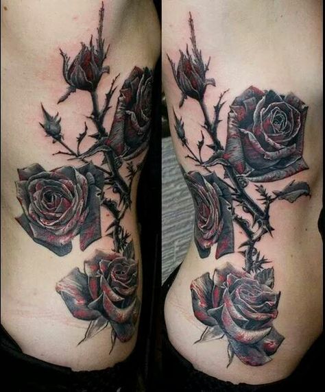 Black with a hint of red roses = epic Cross Rib Tattoos, Rose Thorn Tattoo, Rose Rib Tattoos, Dark Roses Tattoo, Rose Vine Tattoos, Black Rose Tattoo, Thorn Tattoo, Rose Tattoo Thigh, Catrina Tattoo