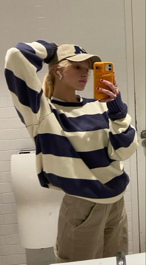 Mirror picture wearing: blue and white striped sweater + brown cargo pants + brown baseball hat Fall Sweaters Striped, What To Wear With A Blue Sweater, Blue Stripe Sweater Outfit, Cute Outfit With Brown Pants, Blue Stripe Sweater, Blue And Cream Striped Sweater Outfit, Striped Fall Sweater, White And Blue Striped Sweater Outfit, White And Blue Sweater Outfit