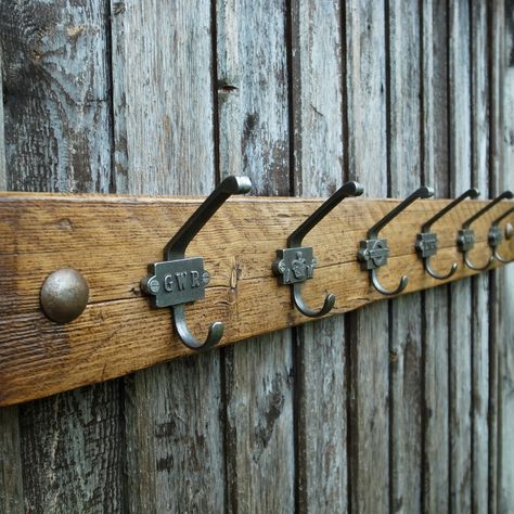 A made to order coat rack in our railway sleeper inspired design, hand-crafted using reclaimed wood and vintage style hooks - this is an eco-friendly product! In chunky reclaimed rustic timber with robust cast iron hooks in 6 vintage industrial transport themed designs. The reclaimed planking feat Railway Theme Interior, Railway Decor, Hallway Style, Industrial Coat Hooks, Hall Storage, Antique Coat Rack, Coat Hook Shelf, Rustic Coat Hooks, Industrial Coat Rack
