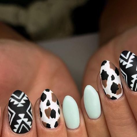 tayler webb on Instagram: "Love a cute aztec western set🩵🤍🤎 . Colors used: @filesbyless finsta, make it make sense @luxapolish hazelnut" Almond Western Acrylic Nails, Small Nail Designs Ideas, Cute Western Christmas Nails, Tan Cow Print Nails, Brown And White Cow Print Nails, Black And Brown Cow Print Nails, Spring Nail Art For Short Nails, Aztec Print Nails, Farm Nail Ideas