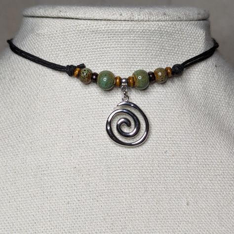 Green Ceramic Beaded Silver Spiral Swirl Charm Boho Hippie Adjustable Black Rope Cord Choker Stacking Necklace Comes On An Adjustable Waxed Black Cord Necklace. Necklace Is Adjustable From Approximately 13" To 22". Leather Bead Necklace, Kate Brock Jewelry, Nature Inspired Jewelry Necklaces, Earthy Necklace Aesthetic, Black And Green Jewelry, Weird Jewelry Necklace, Diy Funky Jewelry, Boho Hippie Jewelry, How To Make Beads Necklace