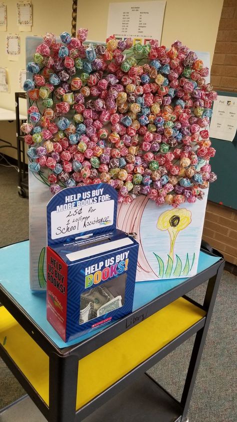 Book Fair Ideas Display, Library Fundraiser Ideas, Library Fundraiser, School Library Book Displays, School Donations, School Book Fair, School Library Decor, Lollipop Tree, School Library Displays