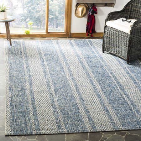 SAFAVIEH Outdoor CY8736-36812 Courtyard Light Grey / Blue Rug Instantly transform your backyard, patio, deck, sunroom, veranda, or poolside with a rug from SAFAVIEHs remarkable indoor-outdoor Courtyard Collection. This trendy rug is made with enhanced synthetic fibers in a special sisal weave that achieves intricate designs that are easy to maintain. Take outdoor decorating to the next level with this collections inviting assortment of classic and contemporary designs and coveted fashion-forward Backyard Rugs, Light Grey Blue, Stripe Light, Blue Patio, Coastal Area Rugs, Trendy Rug, Decorative Rugs, Outdoor Decorating, Blue Grey Rug