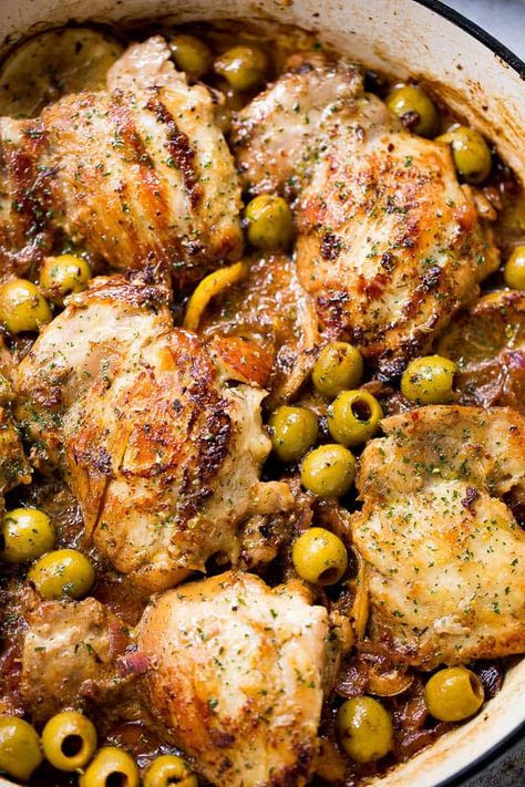 Saucy Skillet Chicken with Lemons and Olives - Delicious pan seared chicken thighs prepared with olives, lemons, and red wine. Pan Seared Chicken Thighs, Seared Chicken, Pan Seared Chicken, Easy Chicken Thigh Recipes, Chicken Skillet Recipes, Olive Recipes, Chicken With Olives, Chicken Entrees, Mediterranean Chicken