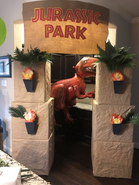 Diy Jurassic Park Birthday Party Decorations, Jurassic Park Float Ideas, Diy Jurassic World Party Decorations, Jurassic Park Gates Diy, Jurrasic World Birthday Party Ideas Diy, Jurassic World Theme Party, Jurassic Park Bulletin Board, Diy Jurassic Park Gate, Diy Jurassic Park Decorations