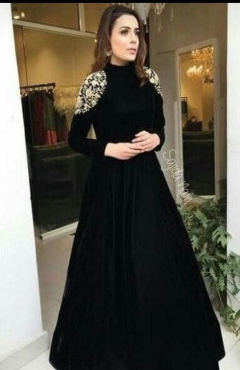 WINTER COLLECTION Ready black Gown Dress Velvet gown with 3 meters ghera Embroidery Sequence work on shoulder Length 51+ Color : Black only All sizes avl Plus size cost extra Size S to XXL, 36 to 44 SLEEVE: Long NECK: Round (as shown Picture) Safety - 100% Sanitized, Instructions: Machine Wash The Velvet Fabric Makes This Anarkali Kurti Soft And Super Comfortable To Wear All Day Long. Pair Up This Kurti With Leggings,Palazzo,Pants etc. This Kurti Dress Will Give You A Trendy Look With its Beauti Mafia Dress, Velvet Anarkali, Black Maxi Dresses, Black Gown Dress, Dress Outfits Party, Gowns Party Wear, Types Of Gowns, Girls Designer Dresses, Kurti Dress