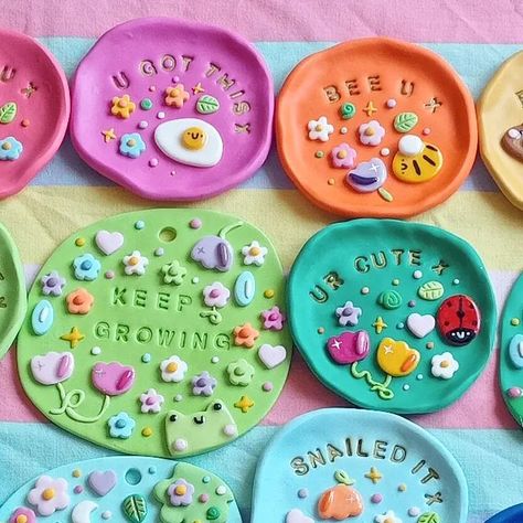 girlscape on Instagram: "12 cute positivity trinket dishes and 3 wall hangings coming tomorrow!!! 6pm UK time 💖🌷🐞☀️✨🐸 - - - - - - #polymerclay #polymerclayjewellery #polymerclaycrafts #trinkettray #trinketdish #ringholder #ringdish #rainbowaesthetic #clayart #clayartist #polymerclaytrinketdish #polymerclayearrings #claytray #homedecor #kawaiihomedecor #kawaiistyle #kawaiiaesthetic #cottagecore #handmadejewelry #handmadeuk #smallbusiness #smallbusinessuk #etsyhandmade #etsyshop #etsysellersof Fimo, Air Dry Clay Trinket Dishes Aesthetic, Polymer Clay Wall Hangings, Polymer Clay Tray, Air Dry Clay Trinket Dishes, Air Dry Clay Trinket Dish, Diy Trinket Dish, Polymer Clay Dish, Polymer Clay Trinket Dish